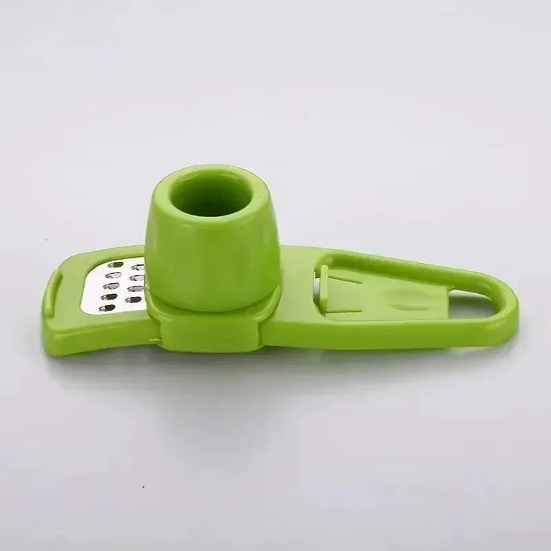 Hot 1 Pack Mini Garlic Grinder Creative Garlic Press Kitchen Garlic Mash Manual Mashing Green Kitchen Gadgets Accessories